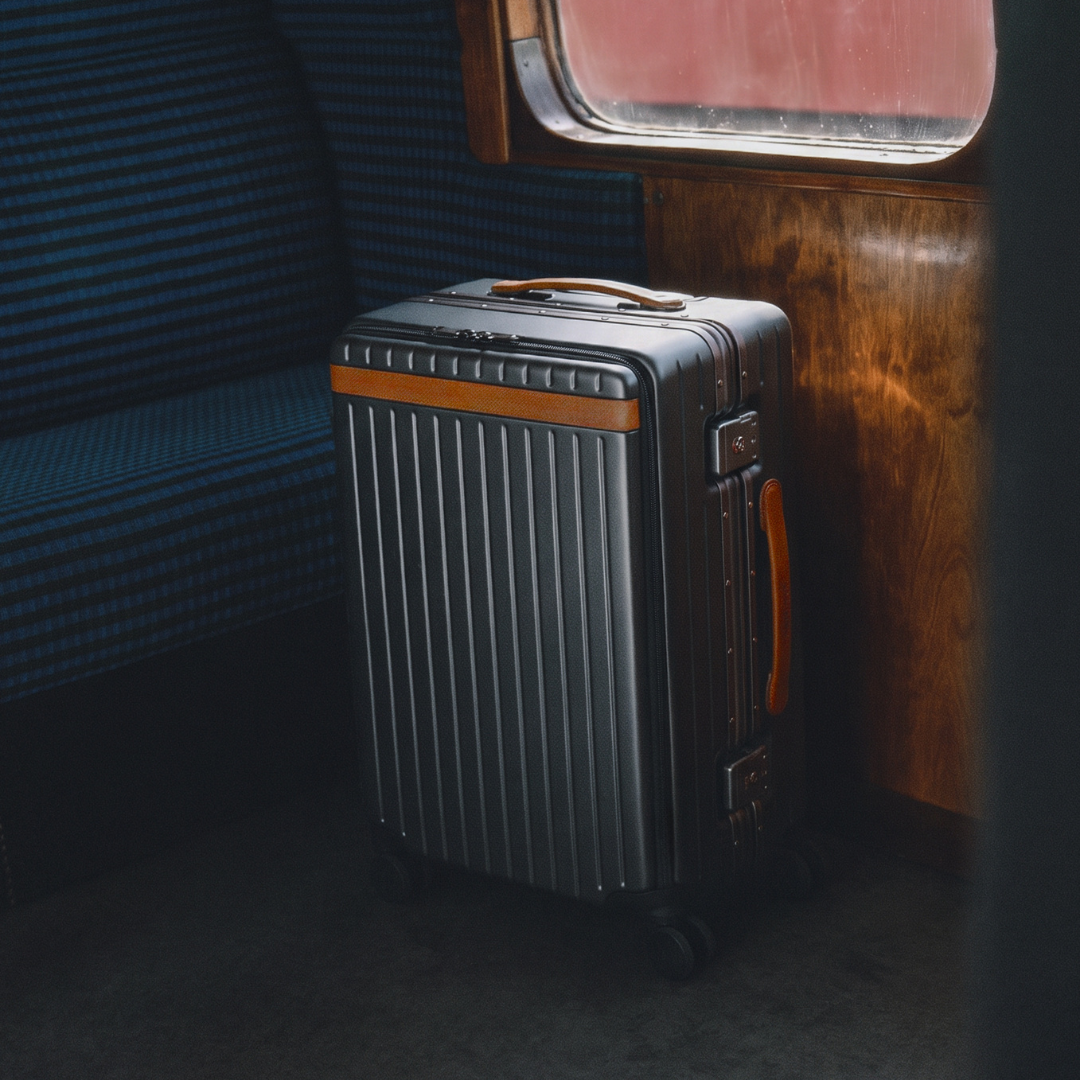 The Carry-on X Hard-shell suitcase with front pocket